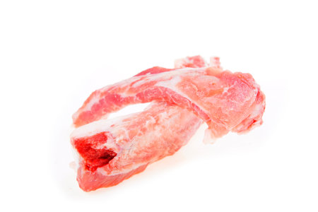 Pork with bones, pork ribs on a white background, fresh and tender meat, alternating between red and white.の写真素材