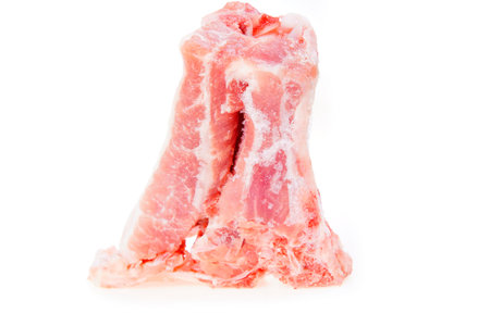 Pork with bones, pork ribs on a white background, fresh and tender meat, alternating between red and white.の写真素材