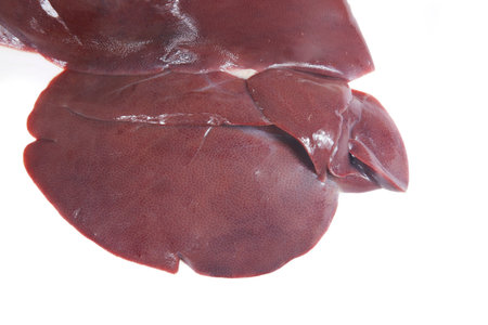 Pig liver is very fresh on a white background.