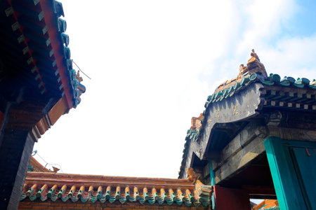 The blue glazed tiles on the wall as the background, the traditional architecture, Very elegant
