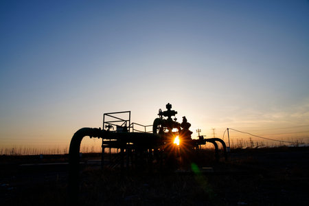 Oil and gas processing plant with pipe line valves.Steel pipelines and valves.Oil pipeline valves in...