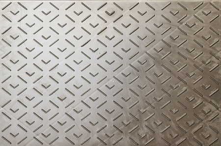 relief metal or plastic plate background, textureの写真素材