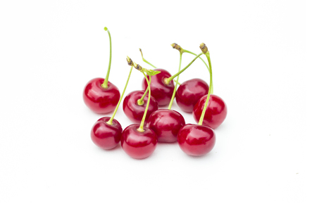 Fresh sweet cherries fruit, juicy ripe red cherry, berry, isolated on the white backgroundの写真素材