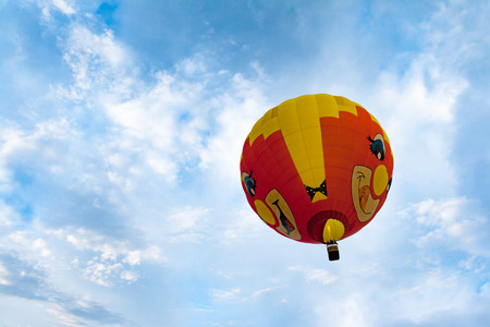 Bright balloons floating in the sky.の写真素材