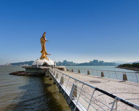Macau - October 29, 2014 : statue of kun lam, religion sacred landmark and buddhists tourism belief. Famous tourist attractions and landscape in macao, China. Traveler's destinations.の写真素材