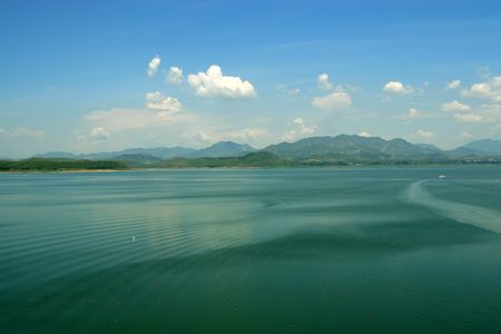 reservoir natural scenery blue sky and white cloudy in north chinaの写真素材