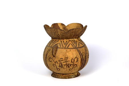 coconut shell handicrafts in white backgroundの写真素材