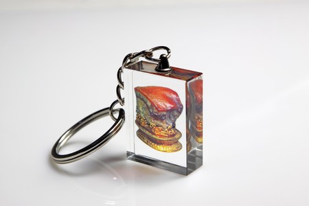 close up of key-chain, a piece of meat in the plexiglass.の写真素材