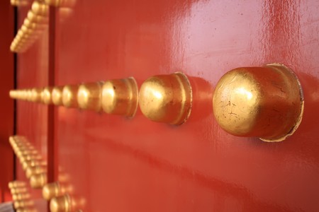 doornail and door knockers in the temple of heaven in beijingの写真素材