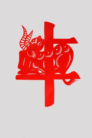 chinese paper-cut works in simple color backgroundの写真素材
