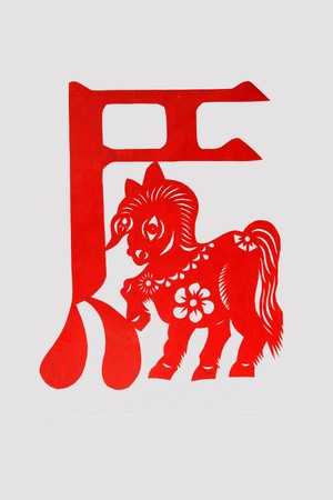 chinese paper-cut works in simple color backgroundの写真素材