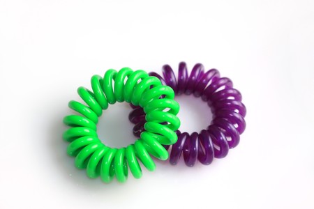 colored plastic ring in white backgroundの写真素材