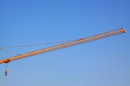 tower crane in the blue sky backgroundの写真素材