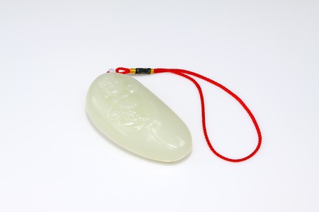 close up of jade object on a white background.の写真素材
