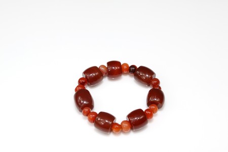 close up of jade bracelet on a white background.の写真素材