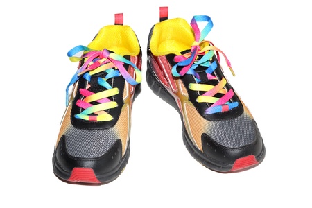 close up of colorful sports shoes on a white background.の写真素材