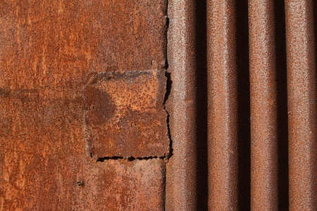 patched oxidation rust iron plateの写真素材