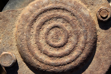 rusted brown metal concentric component の写真素材