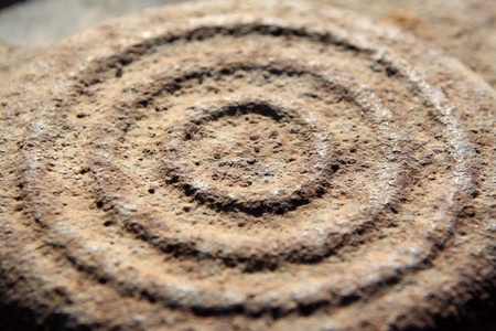 rusted brown metal concentric component 
