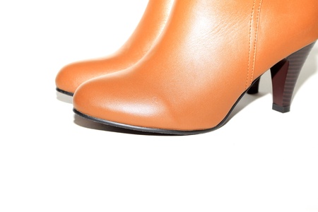 yellow leather shoes on a white background
