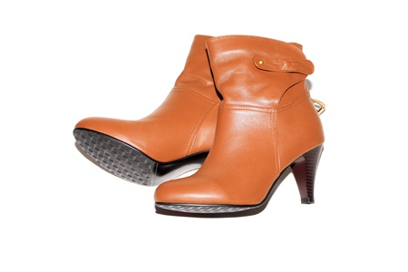 yellow leather shoes on a white backgroundの写真素材