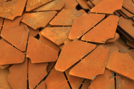 pieces of rusty steel in a factory の写真素材