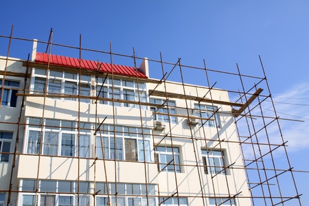 high rise building under the blue sky