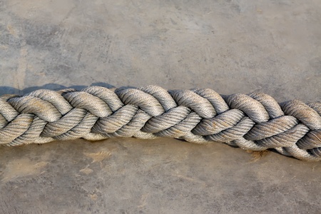 closeup of nylon rope in the groundの写真素材