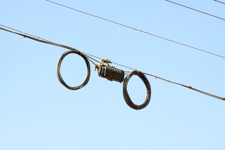 transmission lines in the blue skyの写真素材