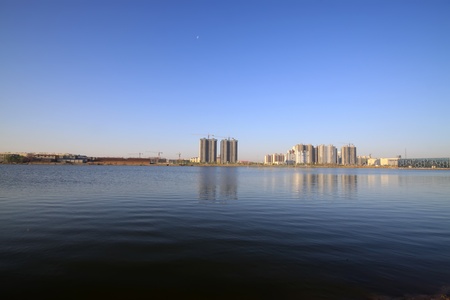 building by the lake in north chinaの写真素材