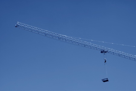 crane tower construction equipment in blue sky  の写真素材