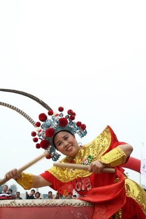 ornate women beat drums shows in north chinaのeditorial素材