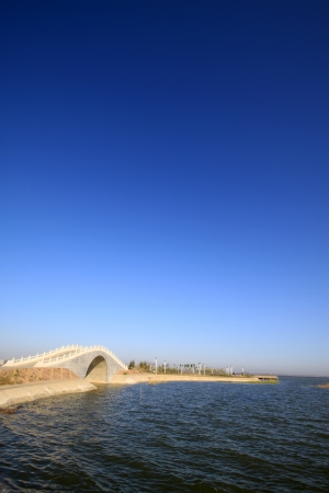 bridges in the lake water, in the blue sky, Hengshui city, hebei province, China の写真素材
