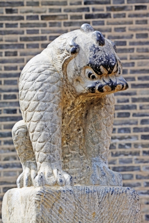 Ancient Chinese traditional stone carving in a scenic spot, in zhangjiakou city, hebei province, China の写真素材