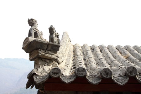 beast sculpture in the eaves in a temple, Chinese traditional  architectural style
の写真素材