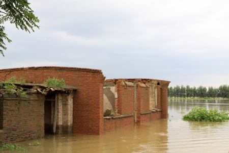 Luannan, Buildings and trees in the flood, Luannan, Hebei, China  の写真素材