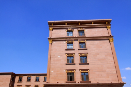 brown high rise buildings in blue sky in north chinaのeditorial素材