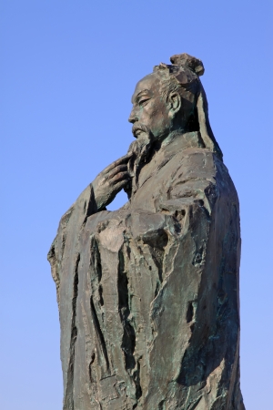 Figure sculpture in the blue sky in a park, north chinaのeditorial素材
