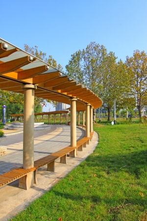 Bench in the park in autumn in china の写真素材