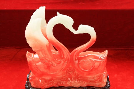 swan plastic crafts in a market, closeup of photoの写真素材