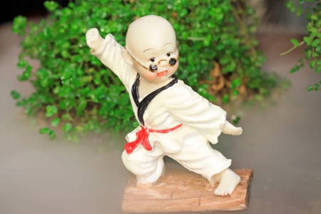little monk ornaments in a market, closeup of photoの写真素材