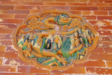 ZUNHUA - MAY 11: Dragon and Phoenix Gate glazed tile decoration in the Eastern Royal Tombs of the Qing Dynasty on May 11, 2013, Zunhua, Hebei Province, china.のeditorial素材