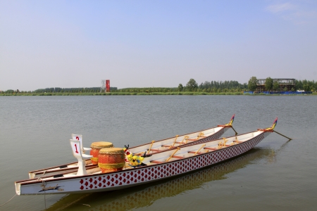 LUANNAN - JUNE 14: Dragon boat anchored on surface of river in  North River Park on June 14, 2013, Luannan, Hebei Province, China.
のeditorial素材