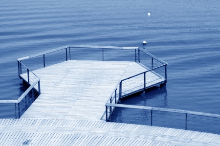 Wooden platform on the water in a parkの写真素材