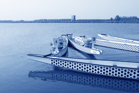 LUANNAN - JUNE 14  Dragon boat anchored on surface of river in  North River Park on June 14, 2013, Luannan, Hebei Province, China のeditorial素材