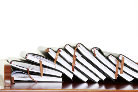 black notebook on the table, closeup of pictureの写真素材