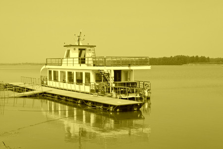 cruise ship docked in simple pier in the fall, north chinaのeditorial素材