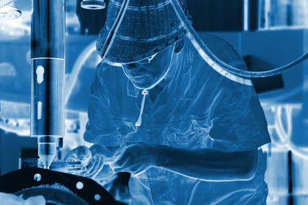 industrial workers in production line in a factory, north chinaのeditorial素材