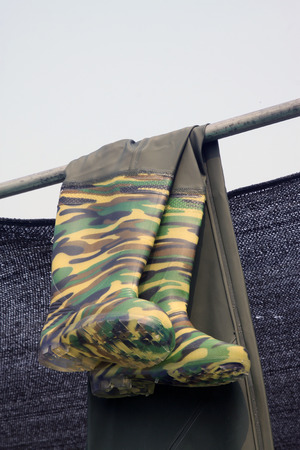 Boot cut hung in the market, closeup of photoの写真素材