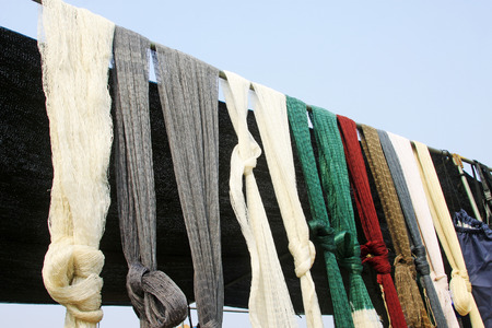 suspension of fishing nets in the market, closeup of photoの写真素材